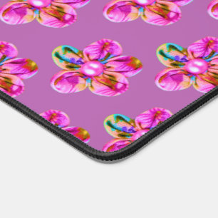 Bright pink, purple hand sewn flowers on magenta desk mat
