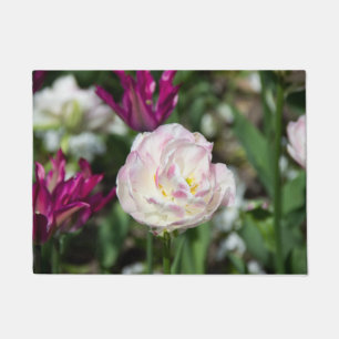 Bright pink tulips on a sunny day doormat