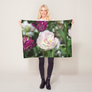 Bright pink tulips on a sunny day fleece blanket