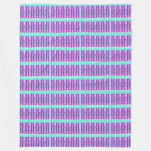 Bright purple skis on blue blanket