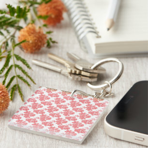 Bright red and pink floral wrapping paper featurin key ring