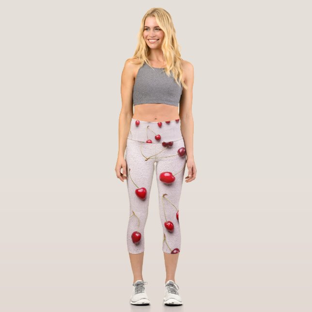 Bright red fruits on white canvas capri leggings (Front)
