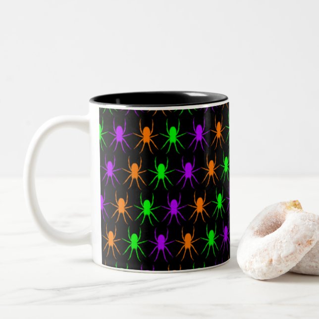 Bright spiders pattern on black Two-Tone coffee mug (With Donut)