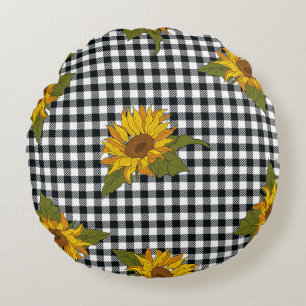 Bright sunflowers on a black and white buffalo che round cushion
