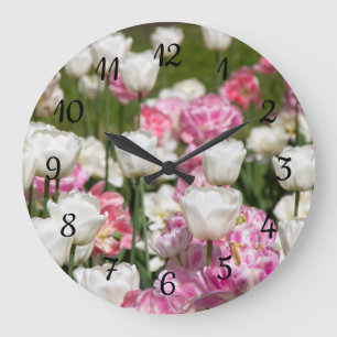 Bright white and pink tulips on a sunny day large clock