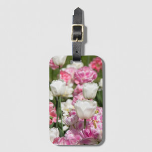 Bright white and pink tulips on a sunny day luggage tag