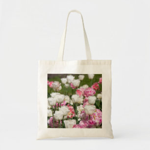 Bright white and pink tulips on a sunny day tote bag
