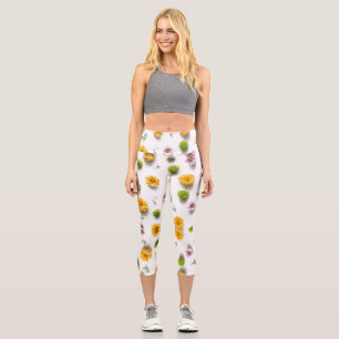 Bright yellow and pink zinnia on white background capri leggings