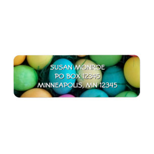 Brightly Coloured Easter Eggs in Basket Photo