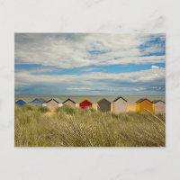 Brightly Coloured Huts on the Beach