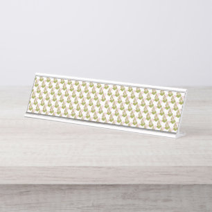 Brightly coloured wrapping paper with a festive pa desk name plate