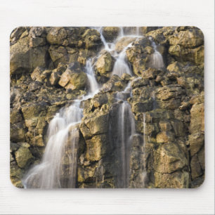 Brine falls from volcanic rock drop off mouse mat