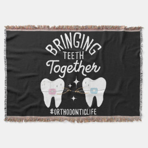 Bringing Teeth Together - Orthodontist Throw Blanket