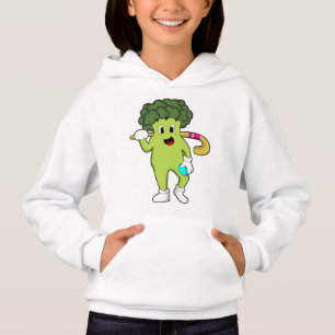 Broccoli at Hockey with Hockey bat