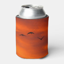 Brolgas flying at sunset can cooler