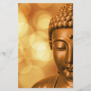 Bronze Buddha Statue with Golden Bokeh Background Stationery