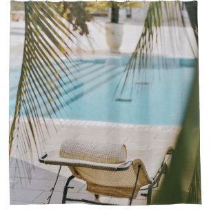 Brown and black armchair beside swimming pool in t shower curtain