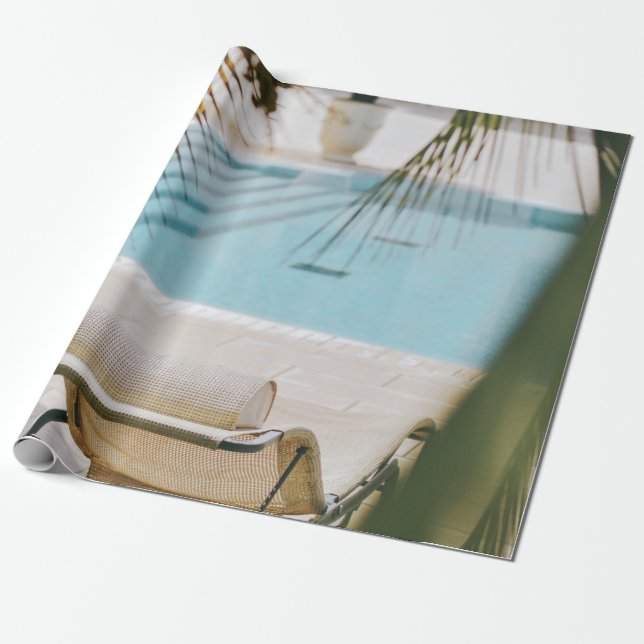 Brown and black armchair beside swimming pool in t wrapping paper (Unrolled)