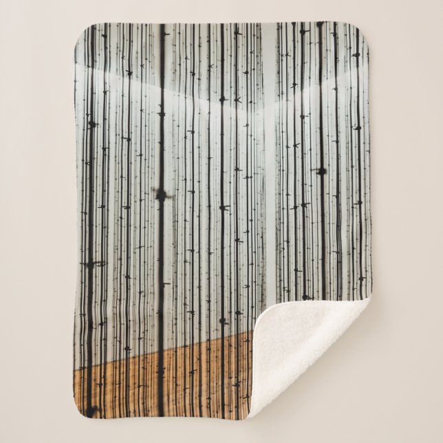 Brown and black illustration sherpa blanket (Front)