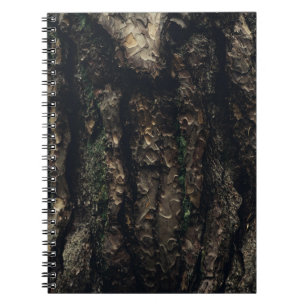 Brown and black tree trunk notebook