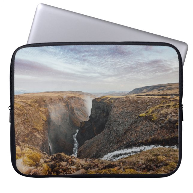 BROWN AND GRAY ROCKY MOUNTAIN UNDER GRAY CLOUDS LAPTOP SLEEVE (Front)