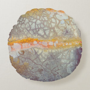 Brown and grey concrete surface round cushion