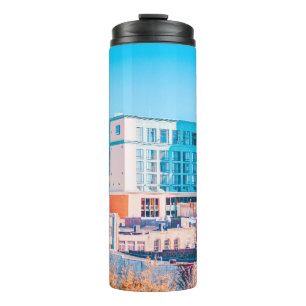 BROWN AND WHITE CONCRETE BUILDING UNDER BLUE SKY THERMAL TUMBLER