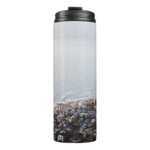 BROWN AND WHITE CONCRETE BUILDINGS THERMAL TUMBLER