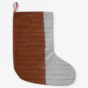 Brown and white concrete wall small christmas stocking