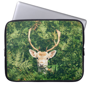BROWN AND WHITE DEER SURROUNDED BY GREEN PLANTS LAPTOP SLEEVE