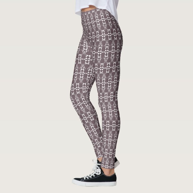 Brown and white geometric ornament pattern leggings (Left)