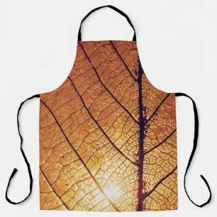 Brown and white leaf print textile apron