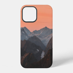 BROWN AND WHITE MOUNTAINS UNDER ORANGE SKY iPhone 12 CASE