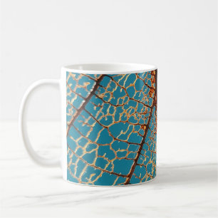 Brown bare tree under blue sky in the morning coffee mug