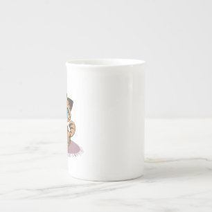 BROWN BLUE-EYED KITTEN ON A PURPLE MAT BONE CHINA MUG
