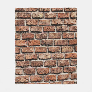 Brown brick wall on daylight fleece blanket