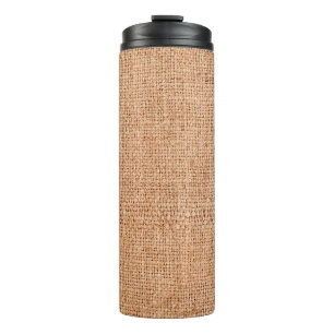 Brown burlap laying on white sheet. Abstract backg Thermal Tumbler