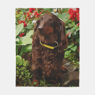 Brown Dachshund Sitting In The Garden With Flower Fleece Blanket