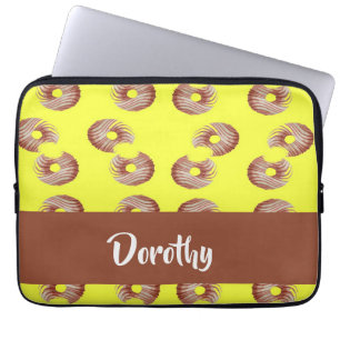 Brown donuts on yellow laptop sleeve