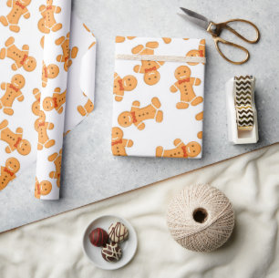 Brown gingerbread man on white wrapping paper