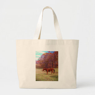 Brown horse in a grass field large tote bag