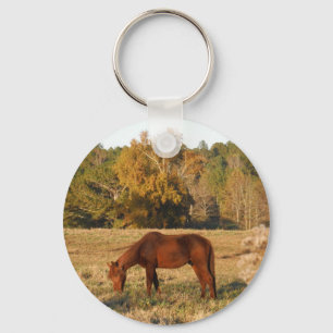 Brown horse in  yellow tree field key ring