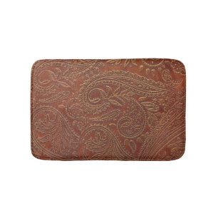 Brown leather, tooled floral pattern. bath mat