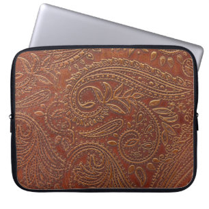 Brown leather, tooled floral pattern. laptop sleeve