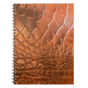 Brown leather with a pattern in the form of a scal notebook
