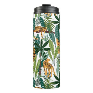 Brown leopard in tropical lush jungle leaves thermal tumbler