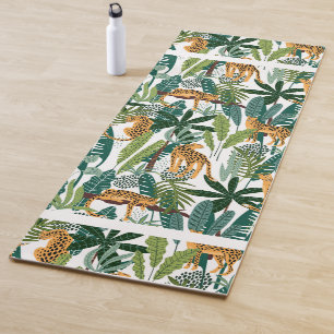 Brown leopard in tropical lush jungle leaves  yoga mat