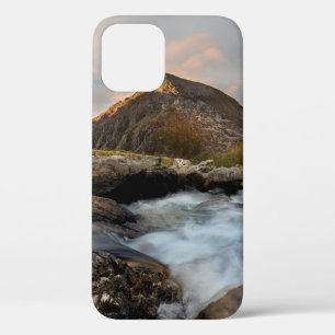 BROWN MOUNTAIN NEAR BODY OF WATER UNDER CLOUDY SKY iPhone 12 CASE