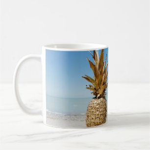 Brown pineapple fruit on seashore coffee mug