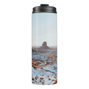 BROWN ROCK FORMATION ON WHITE SNOW COVERED GROUND THERMAL TUMBLER